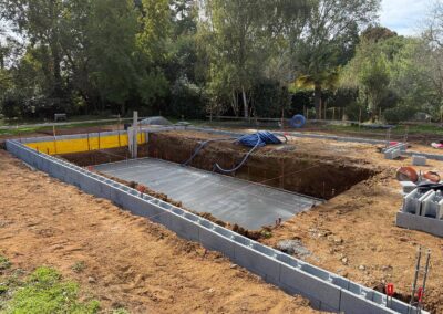 Extension d'une maison avec piscine intérieure