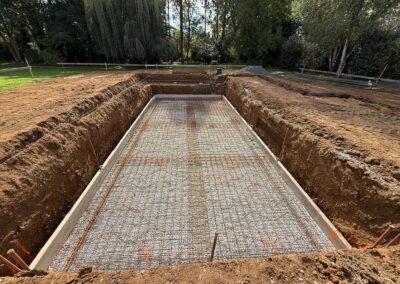 Extension d'une maison avec piscine intérieure